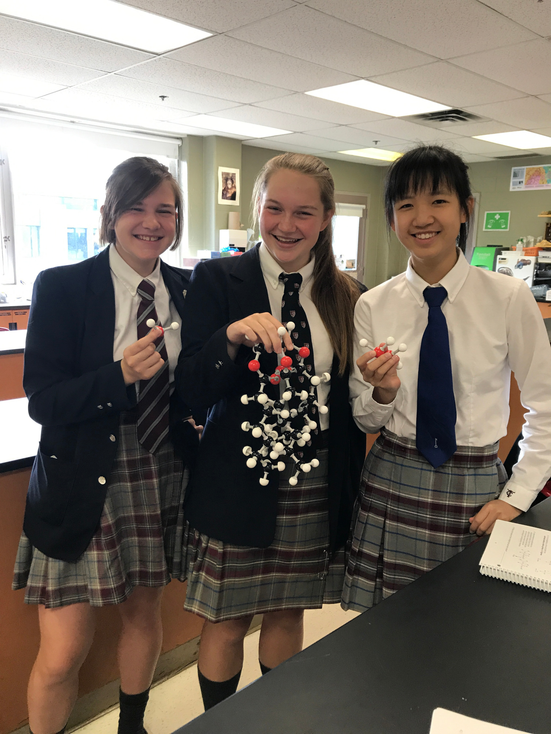 TCS Science Lab - Students Holding Molecule Model
